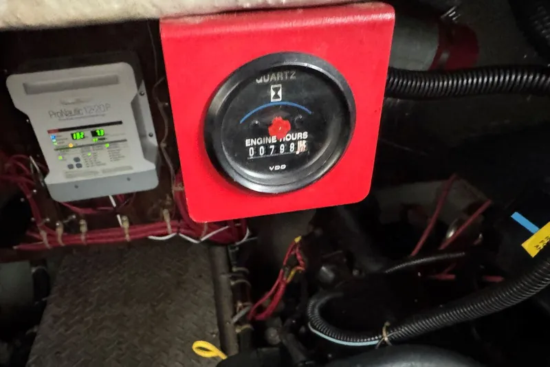 Slide: The Image of Engine hour meter and wiring in a 1994 Regal Commodore 400 boat. - 42