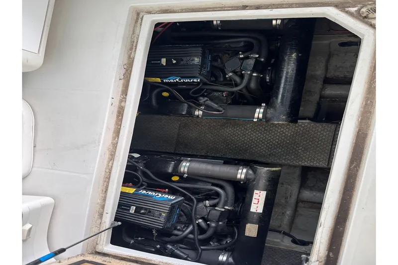 Slide: The Image of Engine compartment of a 1994 Regal Commodore 400 with twin MerCruiser engines. - 38