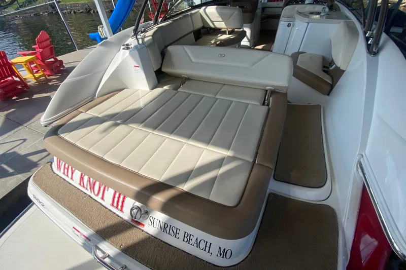 Slide: The Image of 2010 Cobalt 302 boat interior with sun pad, docked at Sunrise Beach, MO. - 12