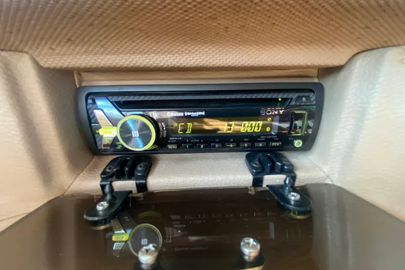 Slide: The Image of Sony car stereo in a 2010 Cobalt 302 boat dashboard. - 26