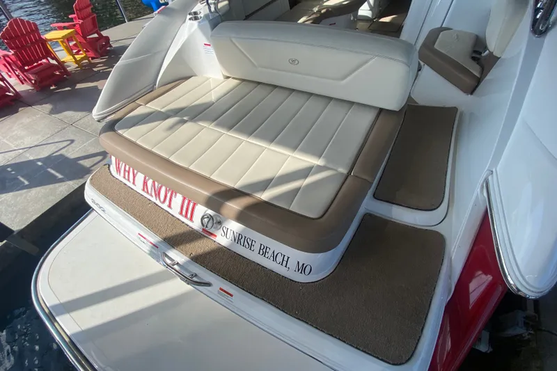 Slide: The Image of 2010 Cobalt 302 boat with cushioned seating, docked at Sunrise Beach, MO. - 11
