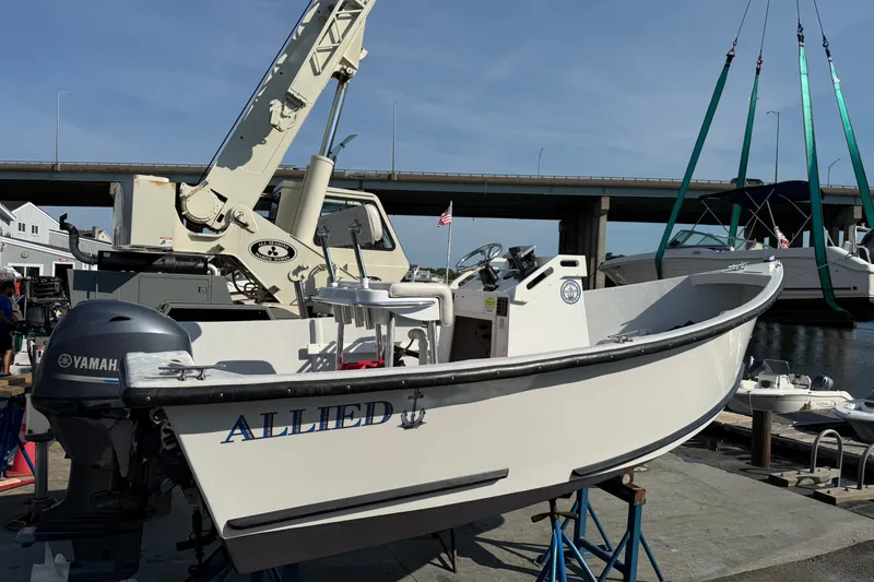 The Image of 2016 Allied 15 Sportsman boat with Yamaha engine on dock, crane in background. - 0
