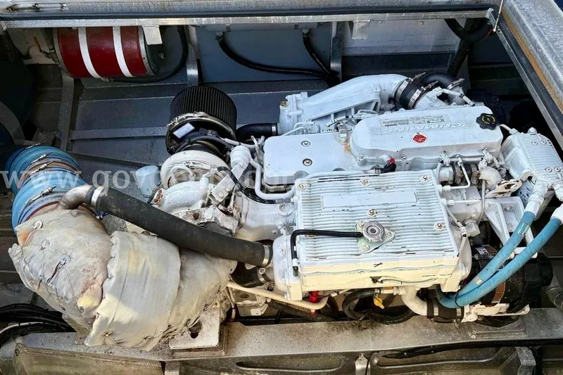 Slide: The Image of Engine compartment of a 2019 Armstrong Marine 38 Monohull boat, showcasing detailed machinery. - 61