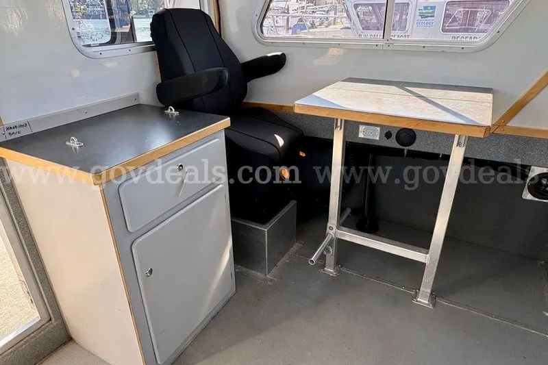Slide: The Image of Interior of 2019 Armstrong Marine 38 Monohull with seating and workspace. - 25