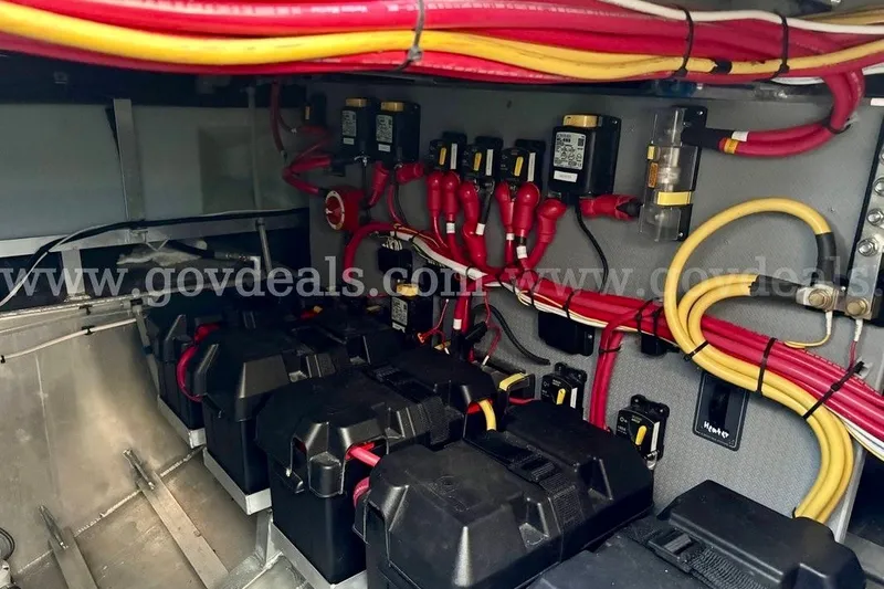Slide: The Image of Electrical system of a 2019 Armstrong Marine 38 Monohull with organized wiring and battery setup. - 50