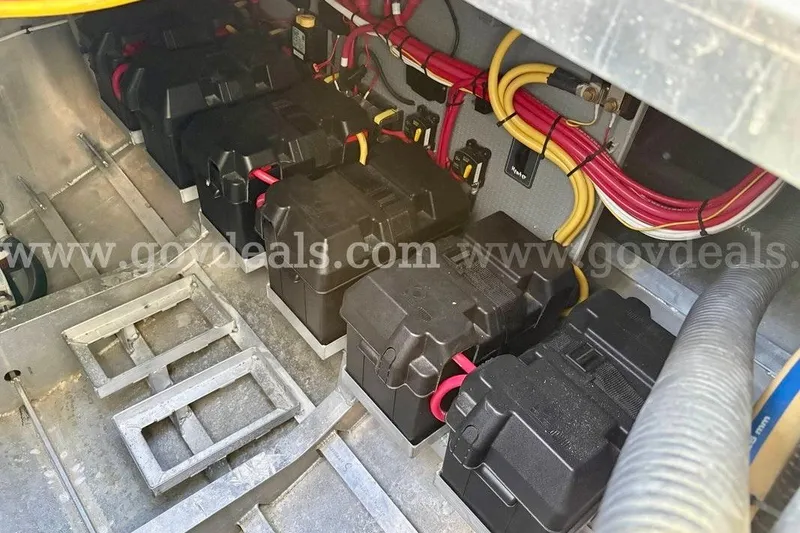 Slide: The Image of Battery compartment of a 2019 Armstrong Marine 38 Monohull with wiring and connections. - 48