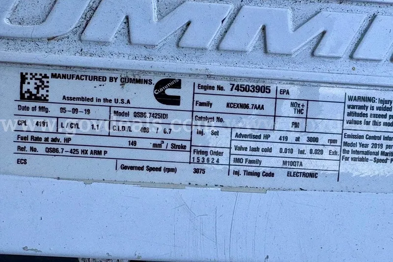 Slide: The Image of Label on Cummins engine for Armstrong Marine 38 Monohull, 2019 model, detailing specifications. - 63