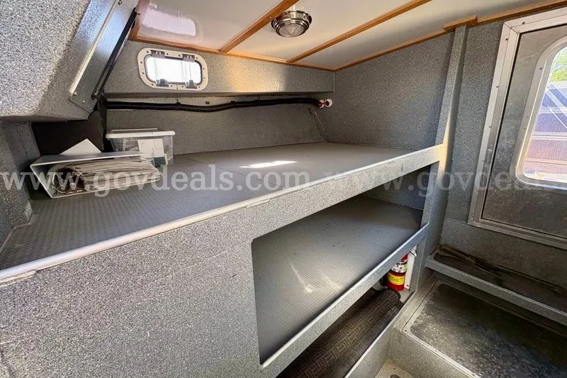 Slide: The Image of Interior of 2019 Armstrong Marine 38 Monohull with storage and window. - 42