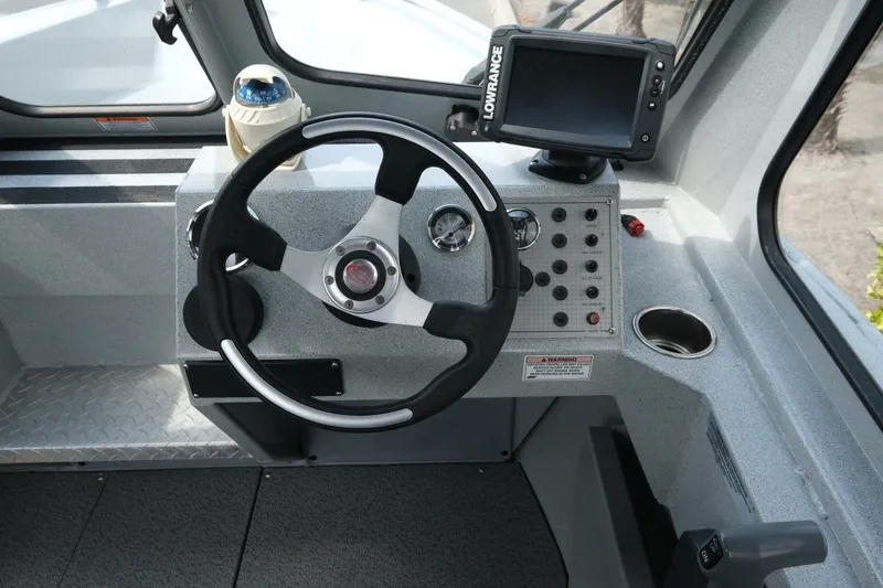 Slide: The Image of Steering console of 2018 Duckworth 18 Advantage Outboard boat with navigation equipment. - 15