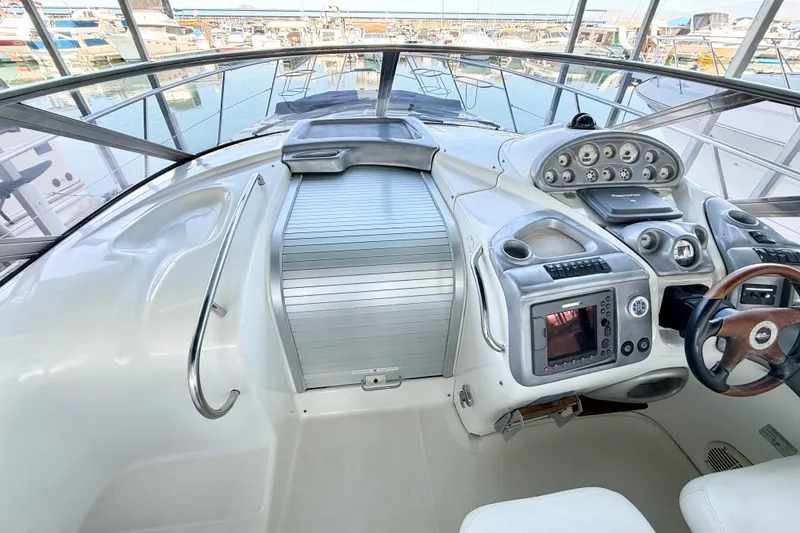 Slide: The Image of Cockpit of 2005 Cranchi Endurance 41 yacht with modern navigation instruments. - 20