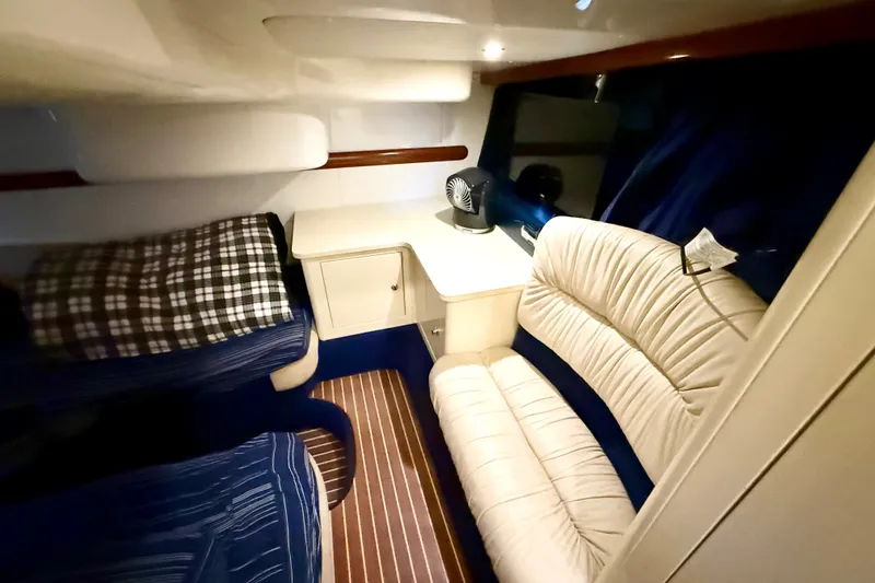 Slide: The Image of Interior of 2005 Cranchi Endurance 41 yacht with cozy seating and striped flooring. - 33