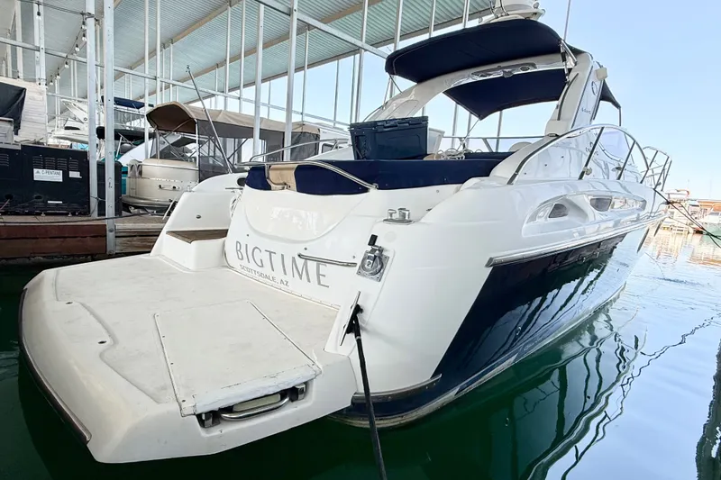 The Image of 2005 Cranchi Endurance 41 yacht docked in marina, rear view. - 0