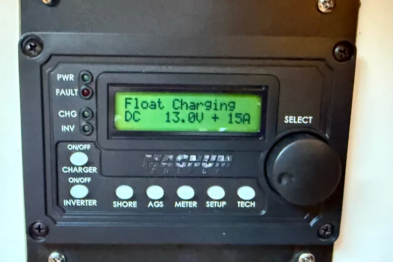 Slide: The Image of Control panel displaying "Float Charging" at 13.0V and 15A on a 2005 Cranchi Endurance 41. - 38