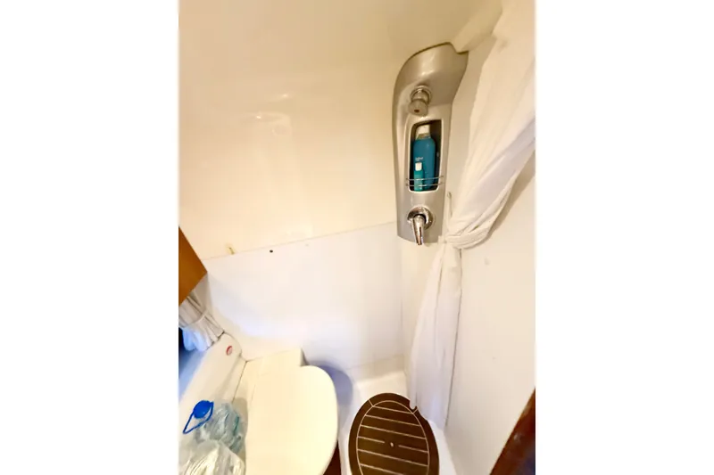 Slide: The Image of Bathroom interior of 2005 Cranchi Endurance 41 yacht, featuring shower and toilet. - 32