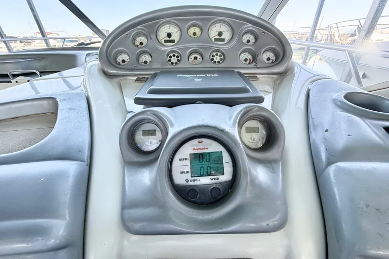 Slide: The Image of Dashboard of a 2005 Cranchi Endurance 41 boat with gauges and controls. - 16