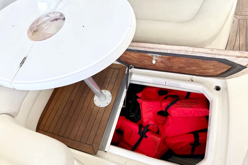 Slide: The Image of Storage compartment with life jackets on a 2005 Cranchi Endurance 41 boat. - 19