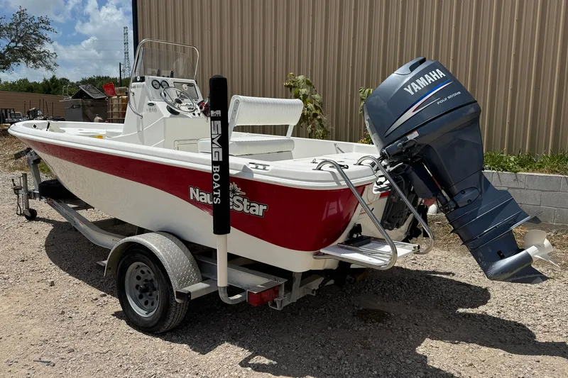 Slide: The Image of 2009 NauticStar 1810 NauticBay boat with Yamaha engine on trailer. - 13