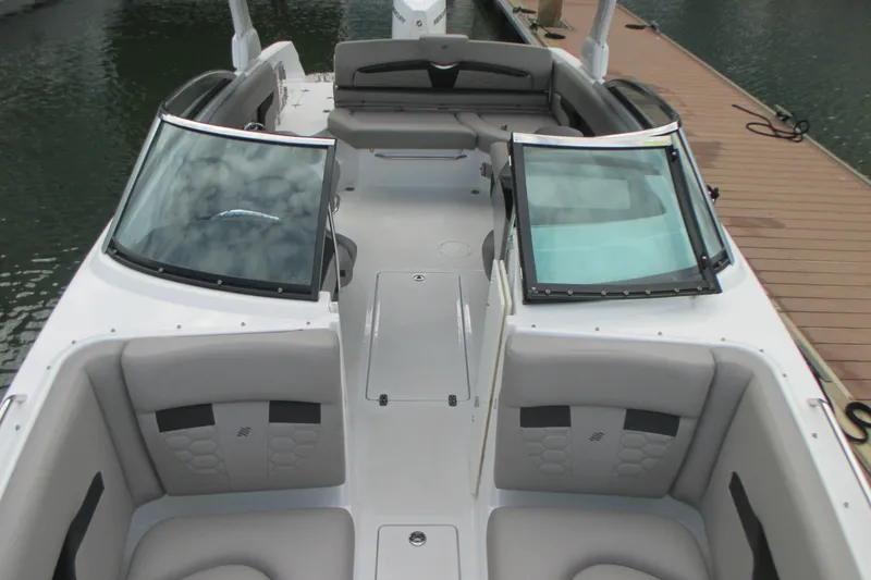 Slide: The Image of 2022 Four Winns HD8 OB boat interior with spacious seating and sleek design. - 19