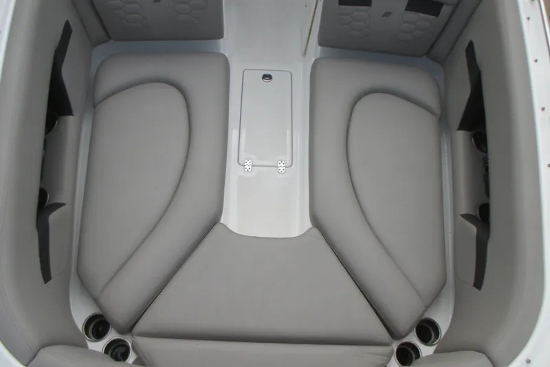 Slide: The Image of 2022 Four Winns HD8 OB boat interior with gray seating and cup holders. - 20