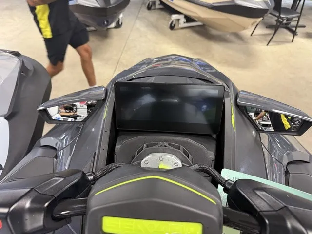 Slide: The Image of Close-up of a Sea-Doo RXT-X jet ski cockpit with digital display and mirrors. - 15