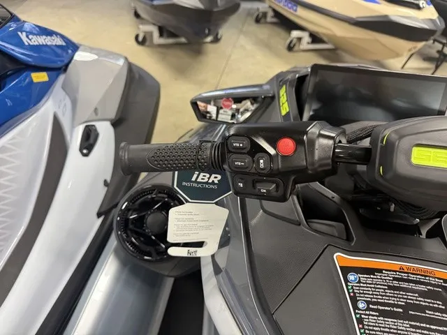 Slide: The Image of Close-up of a 2026 Sea-Doo RXT-X handlebar with control buttons and iBR instructions. - 14