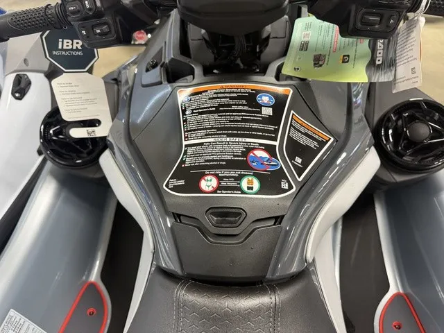 Slide: The Image of Close-up of a Sea-Doo RXT-X jet ski cockpit with controls and instructions. - 18