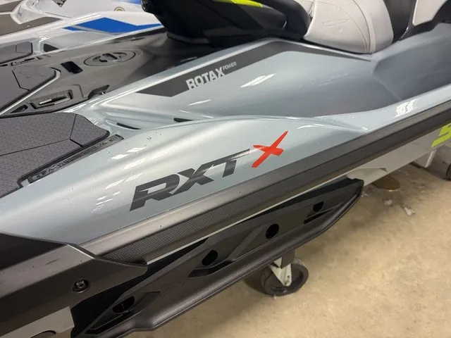 Slide: The Image of Close-up of a 2026 Sea-Doo RXT-X jet ski with a gray and black design. - 7