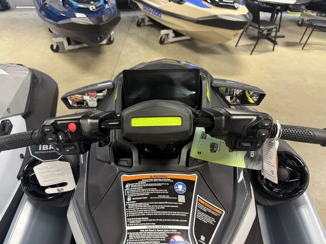 Slide: The Image of Close-up of a Sea-Doo RXT-X jet ski cockpit with digital display and controls. - 13
