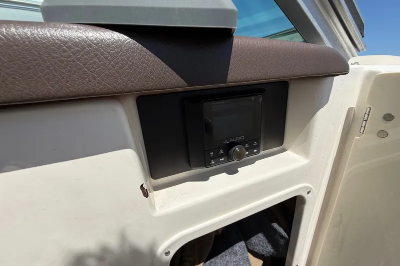 Slide: The Image of JL Audio system on 2014 Chaparral 226 SSi boat dashboard. - 33