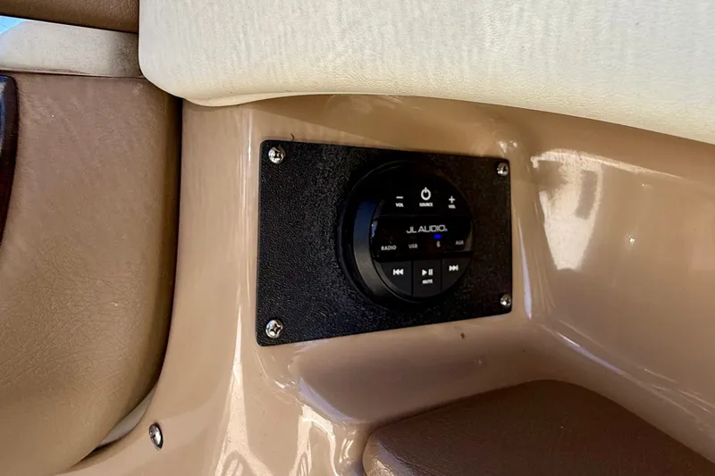 Slide: The Image of JL Audio control panel in 2014 Chaparral 226 SSi boat interior. - 31