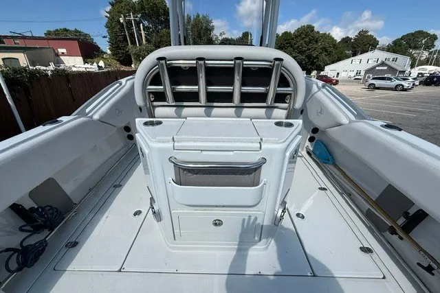 Slide: The Image of 2022 Finseeker 230 FS boat interior with seating and storage compartments. - 8
