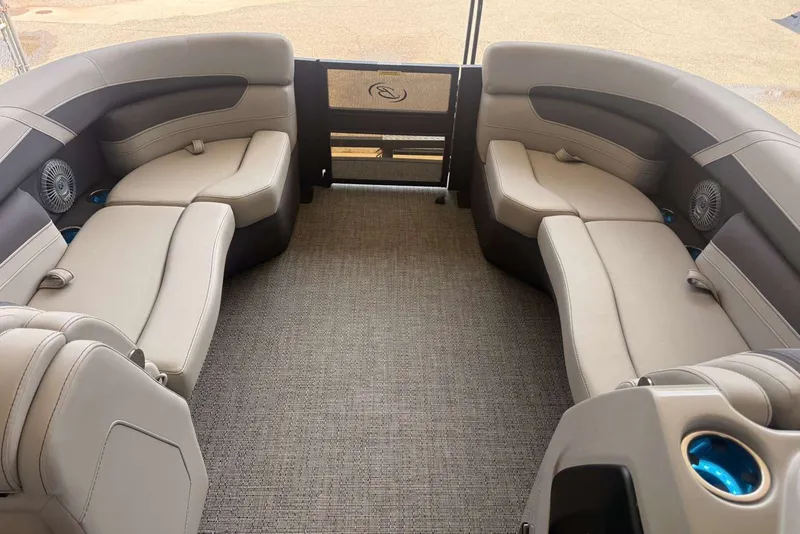 Slide: The Image of Luxurious interior of 2025 Barletta Cabrio 24UE pontoon boat with plush seating. - 15