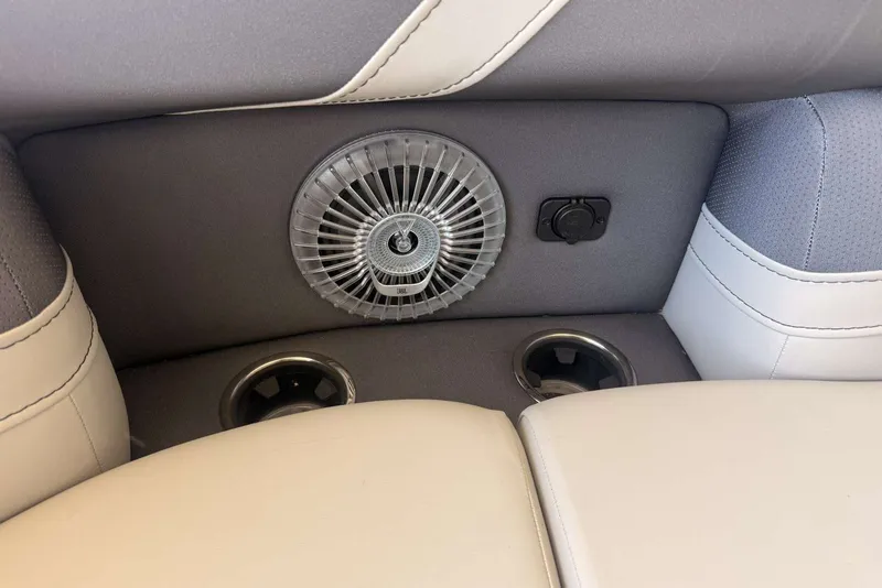 Slide: The Image of Interior of 2025 Barletta Cabrio 24UE with speaker and cup holders. - 29
