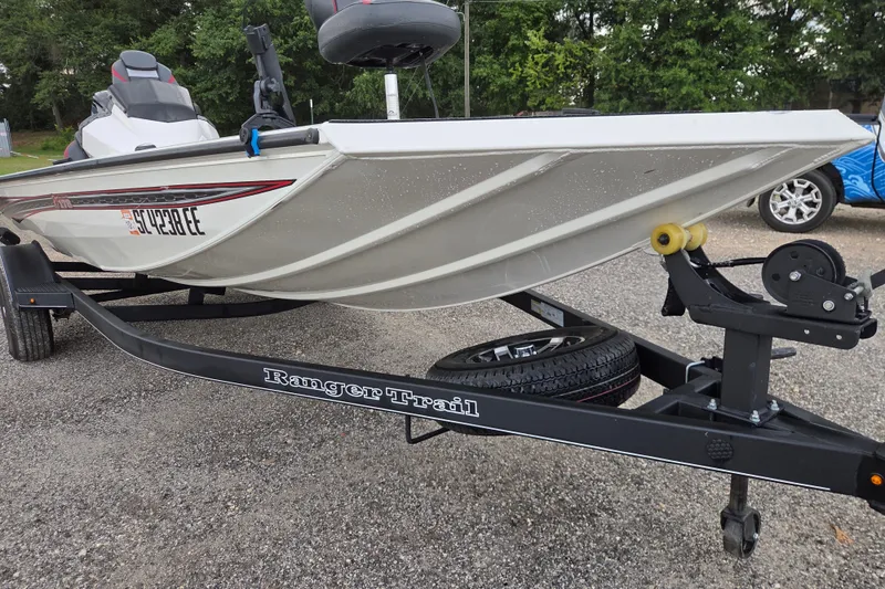 Slide: The Image of 2023 Ranger RT178 boat on Ranger Trail trailer in parking lot. - 4