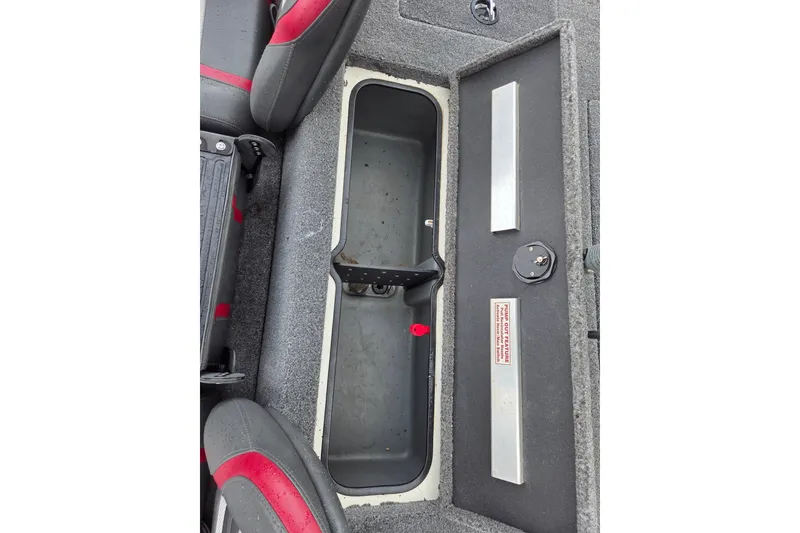 Slide: The Image of 2023 Ranger RT178 boat storage compartment with gray and red seating. - 11