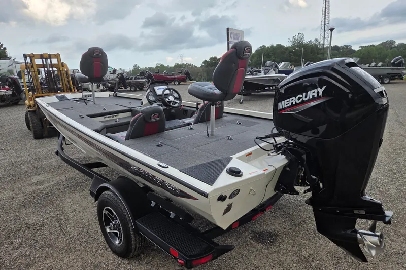 Slide: The Image of 2023 Ranger RT178 boat with Mercury engine, parked outdoors on gravel. - 8