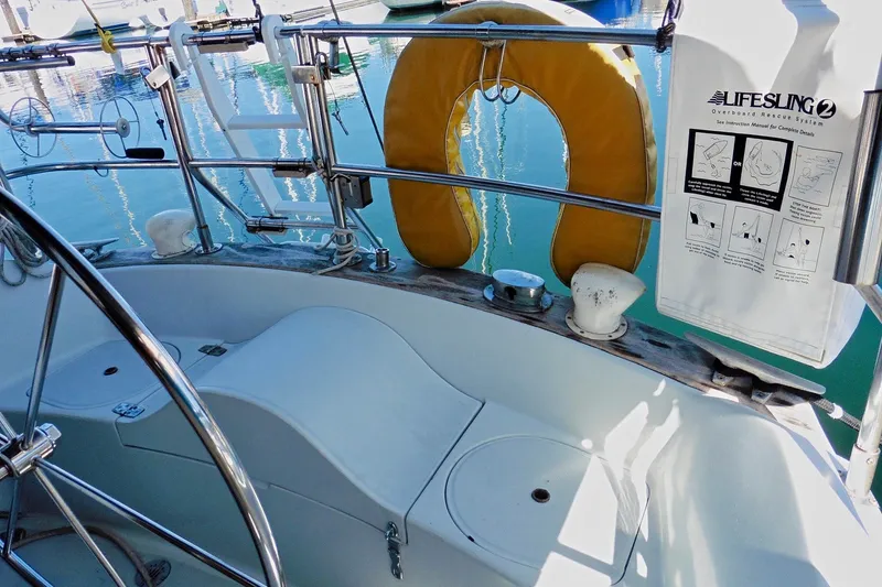 Slide: The Image of Cockpit of 1986 Ericson 35.3 sailboat with lifesling and safety equipment. - 17