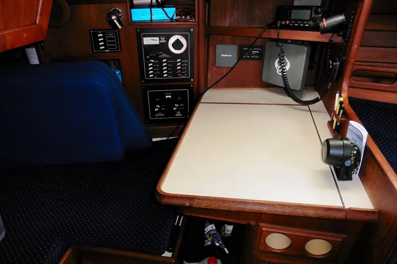 Slide: The Image of Interior of 1986 Ericson 35.3 sailboat with navigation equipment and control panel. - 21