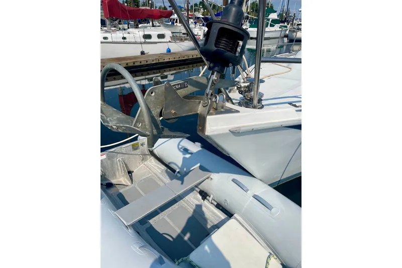 Slide: The Image of 1986 Ericson 35.3 sailboat with anchor and rigging at marina dock. - 13