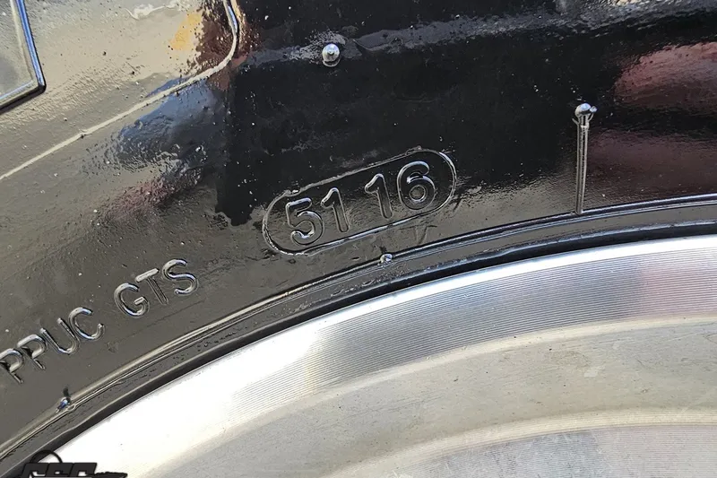Slide: The Image of Close-up of a 2003 Baja 342 boat hull with "5116" and "PPUC GTS" markings. - 89