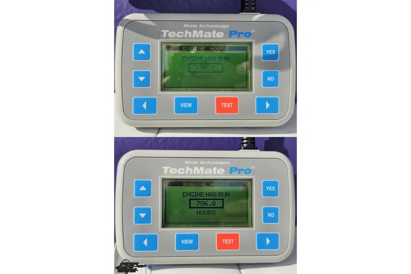Slide: The Image of TechMate Pro engine hour meter displaying 653.5 and 706.0 hours for 2003 Baja 342. - 91