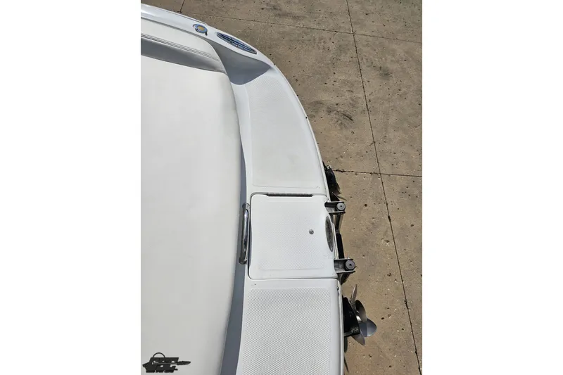 Slide: The Image of Rear deck view of a 2003 Baja 342 boat, showcasing sleek design and propeller. - 34