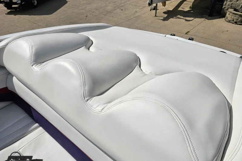 Slide: The Image of White leather seating on a 2003 Baja 342 boat, showcasing sleek design and comfort. - 39