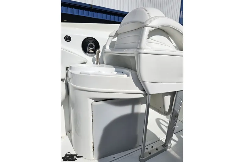 Slide: The Image of 2003 Baja 342 boat interior with white seating and sleek design. - 42