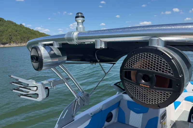 Slide: The Image of 2023 MasterCraft XT23 boat with Klipsch speakers on a sunny lake. - 20