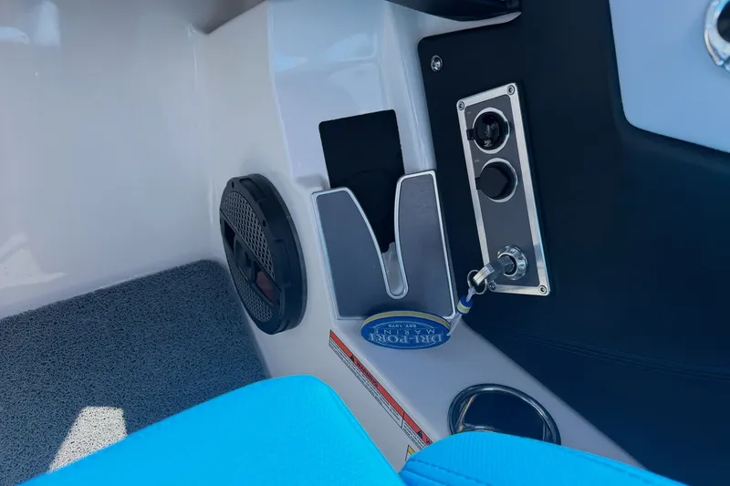 Slide: The Image of Interior of 2023 MasterCraft XT23 boat with speaker and control panel. - 14