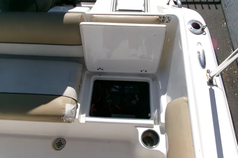 Slide: The Image of 2020 Key West 203 DFS boat interior with open storage compartment and seating. - 15