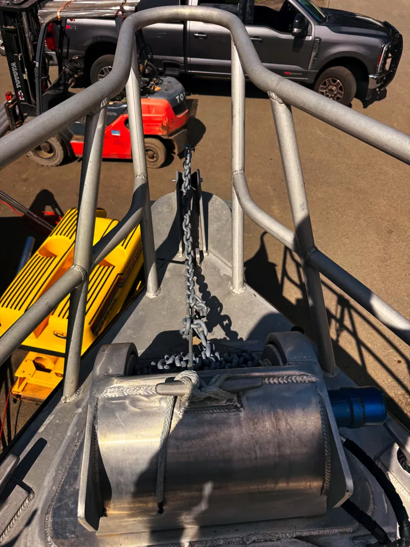 Slide: The Image of Bow of an aluminum patrol boat with anchor winch and chain. - 21