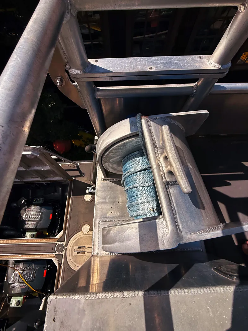 Slide: The Image of Close-up of a winch on an aluminum boat. - 24