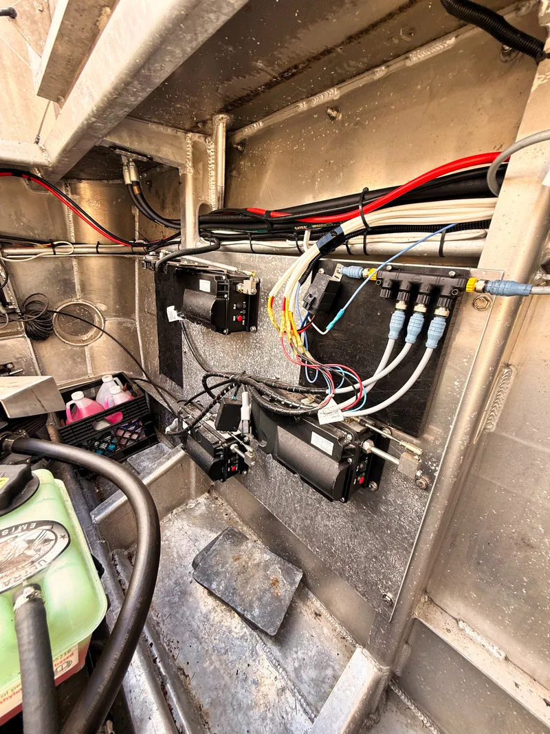 Slide: The Image of Interior view of a Norsco Aluminum Patrol 32 with wiring and electronics. - 17